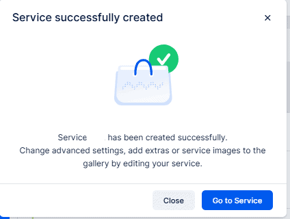 Popup message confirming a service has been successfully created, with options to close or go to the service.