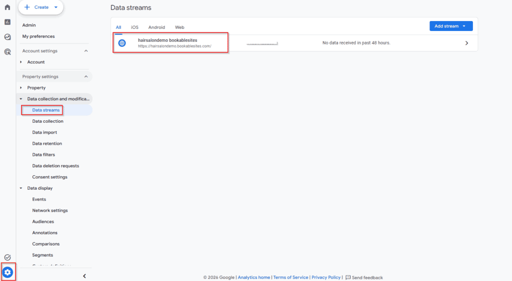 Screenshot of the Google Analytics Data streams page showing one web data stream for "hairsalondenem.booksitelets" and navigation menu options on the left.