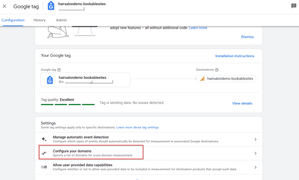 Google Tag Manager interface showing the 'hairsalondemo bookabelsites' tag with options to manage event detection, configure domains, and allow user-provided data capabilities.